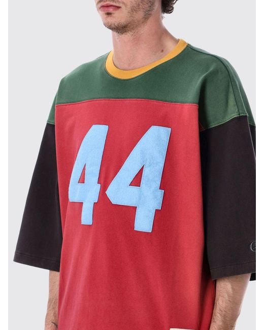 Champion Red Relaxed Fit Cotton T-Shirt With Abstract Print And Contrasting Logo for men