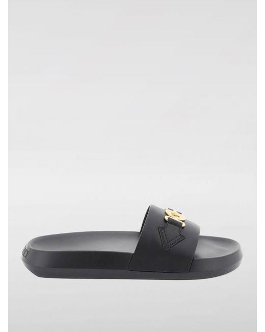 Sandalias planas Versace de color Black