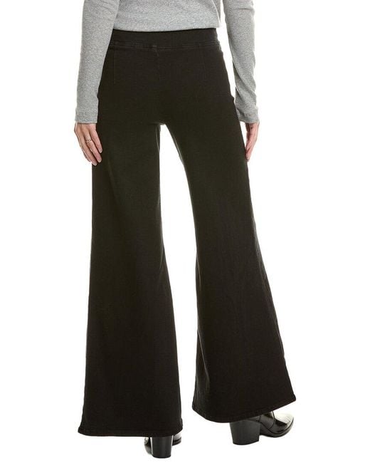 FRAME Black The Jetset Sheen Noir Flare Jean