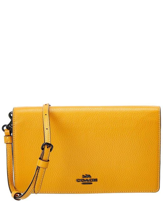 COACH Hayden Leather Foldover Crossbody Clutch in Yellow Lyst
