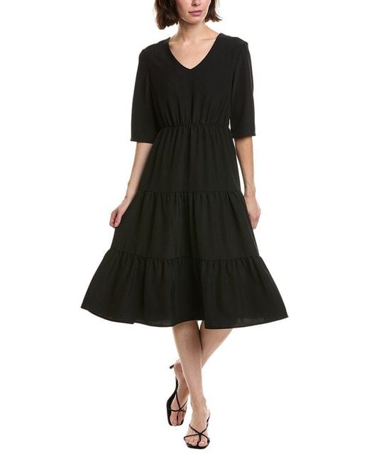 Pascale La Mode Black Solid Ruffle Hem Midi Dress