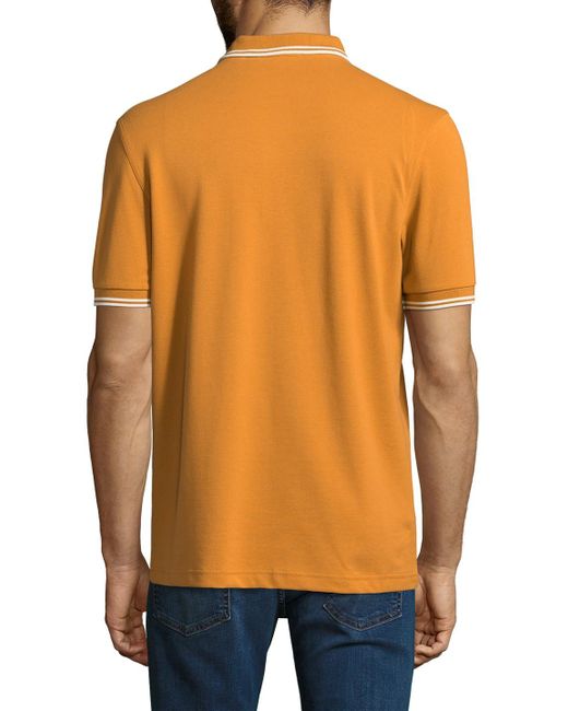 orange fred perry polo