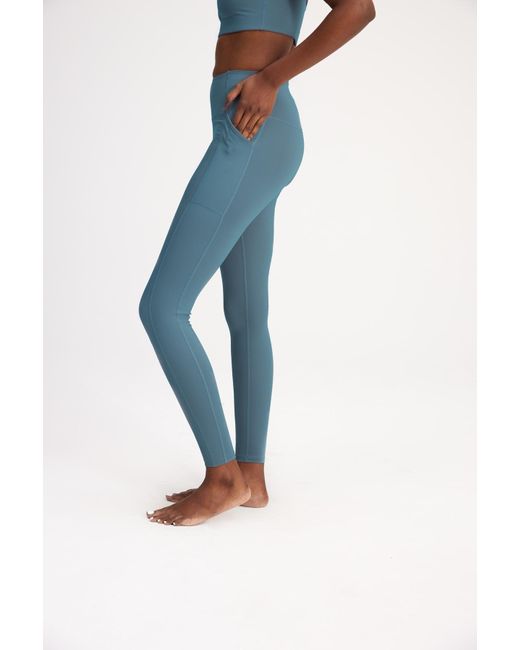 Girlfriend Collective Women's Monarch Compressive Pocket Legging - Blue