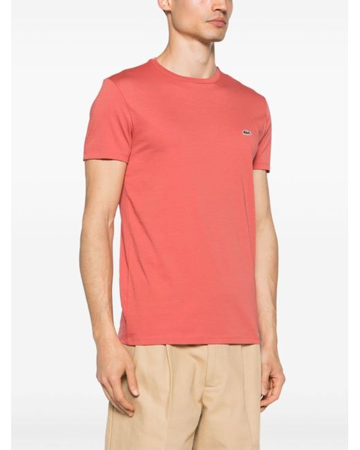 T-shirt con applicazione di Lacoste in Pink da Uomo