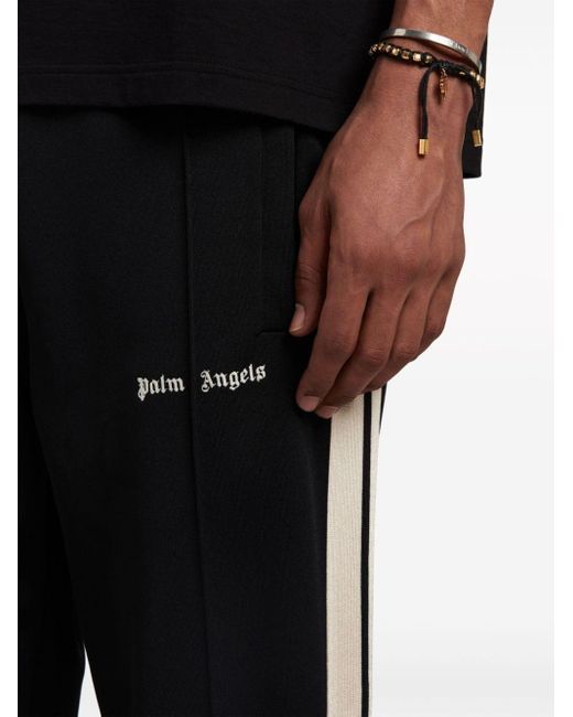 | Pantaloni dettaglio strisce | male | NERO | M di Palm Angels in Black da Uomo
