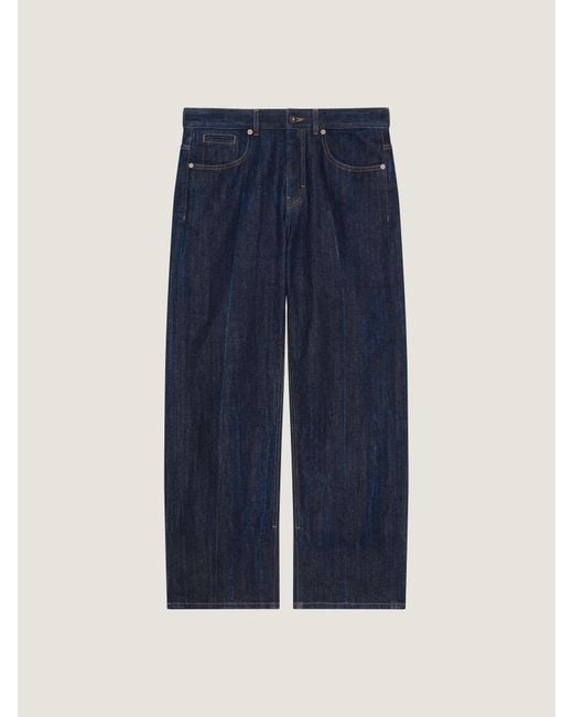 Jeans a gamba ampia in denim di Givenchy in Blue da Uomo