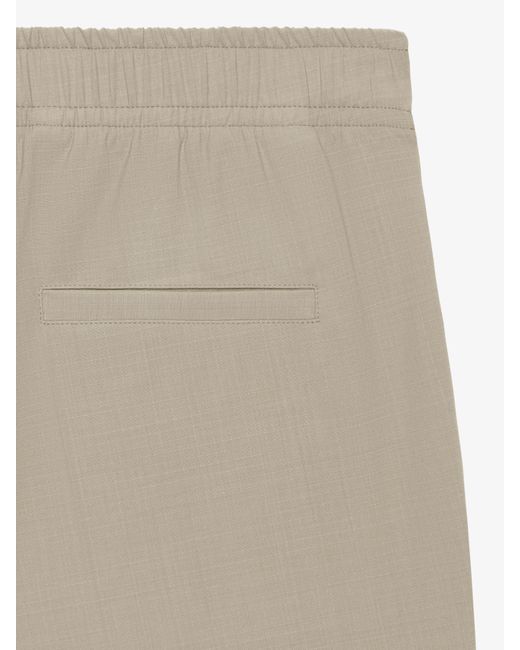 Pantalon slim en laine Givenchy pour homme en coloris White