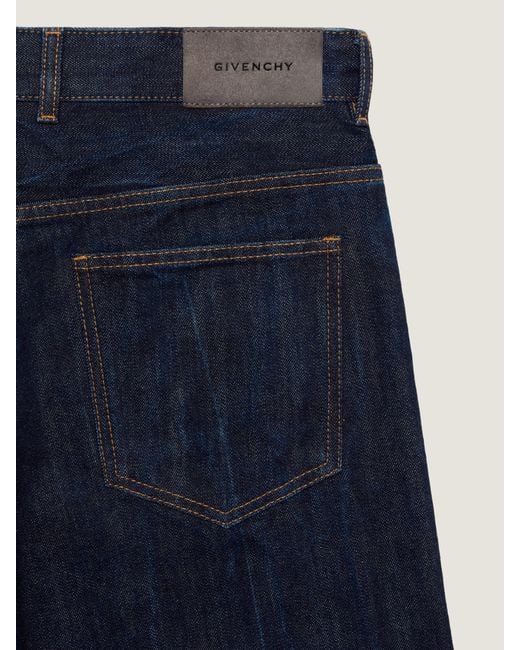 Jeans a gamba ampia in denim di Givenchy in Blue da Uomo