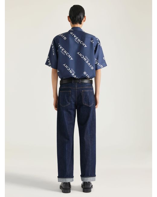 Jeans a gamba ampia in denim di Givenchy in Blue da Uomo