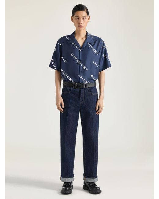 Jeans a gamba ampia in denim di Givenchy in Blue da Uomo