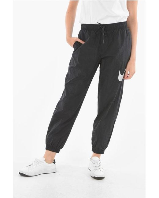 Nike Mid Waist Loose Fit Joggers With Contrasting Logo in Black Lyst UK
