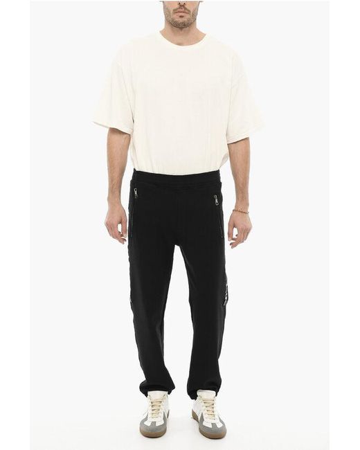 Neil Barrett Black Skinny Fit Joggers With Side Thunderbolts Print for men