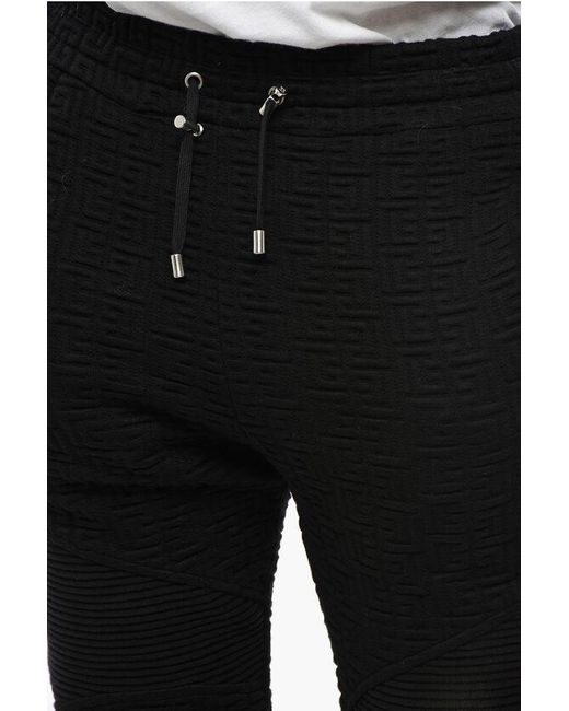 Balmain Black Solid Color Joggers With All-Over Monogram for men