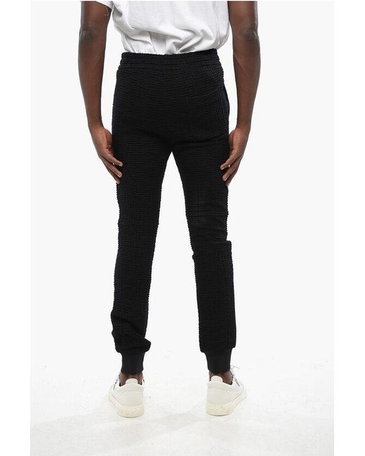 Balmain Black Solid Color Joggers With All-Over Monogram for men