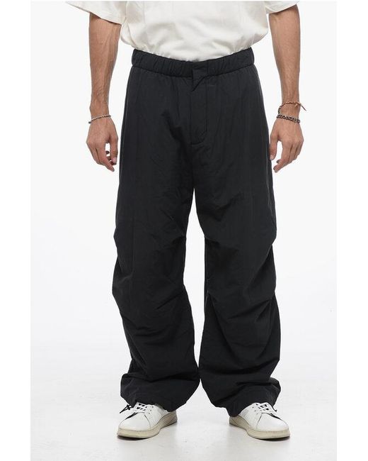 Studio Nicholson Black Drawstring Nylon Padded Trousers for men