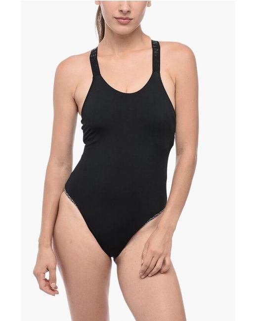 Nike solid swimsuit in black best sale