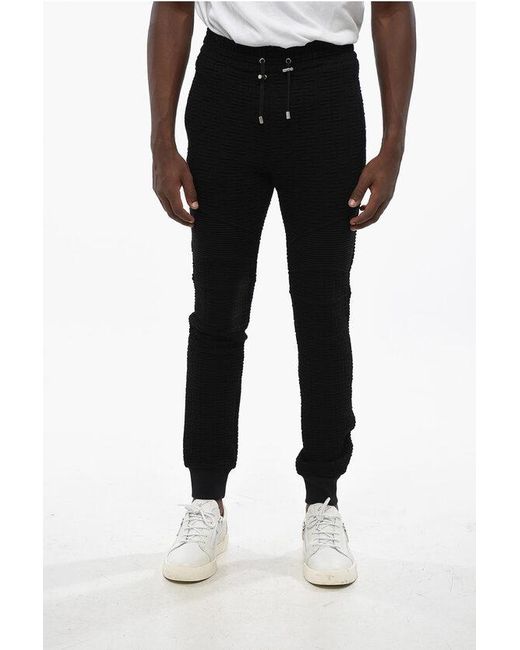 Balmain Black Solid Color Joggers With All-Over Monogram for men