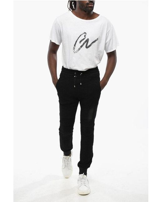 Balmain Black Solid Color Joggers With All-Over Monogram for men
