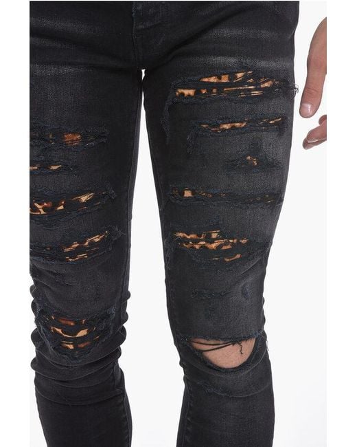 Amiri Black Slim-Fitting Thrasher Denims With Leopard Pony-Skin Details for men