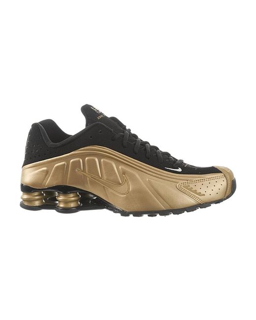 nike shox gold