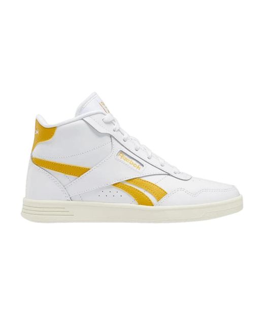 white and gold reebok