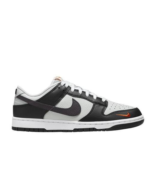 https://www.lyst.com/shoes/nike-dunk-low-mini-swoosh-black-total-orange/