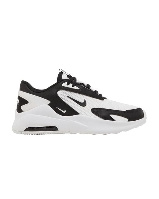 white & black air max bolt trainers