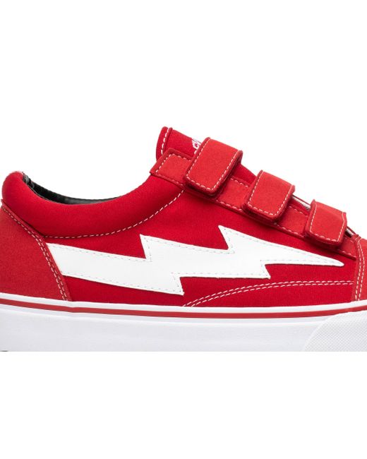 red vans lightning bolt