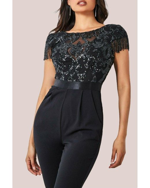 Goddiva Black Tassel Sequin Jumpsuit