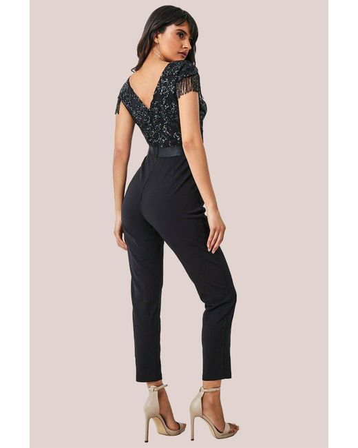 Goddiva Black Tassel Sequin Jumpsuit