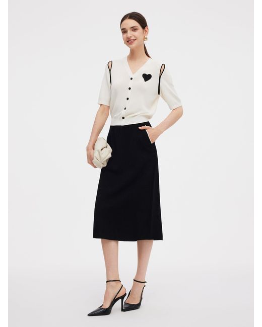 GOELIA White V-Neck Cut-Out Knitted Top And Half Skirt Two-Piece Set