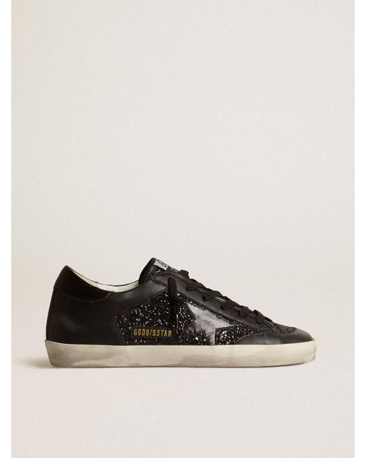 Super Star De Napa Y Purpurina Negras Con Estrella De Piel Brillante Negra Mujer Talla de Golden Goose de color Negro Lyst