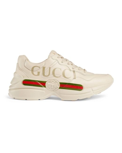 white rhyton gucci logo trainers