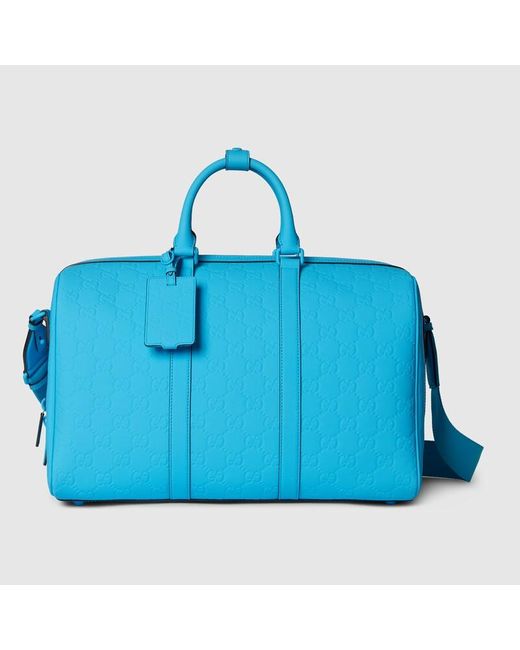 Bolsa de Viaje Efecto Goma con GG Mediana Gucci de hombre de color Blue