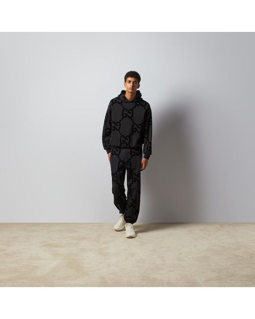 Pantalone Tuta In Pile Di Cotone Con Stampa GG Floccata di Gucci in Black da Uomo