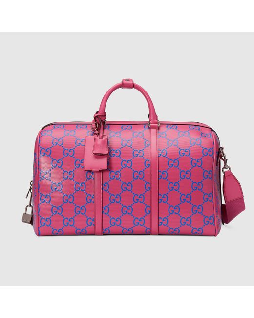Gucci Pink GG Embossed Duffle Bag for men