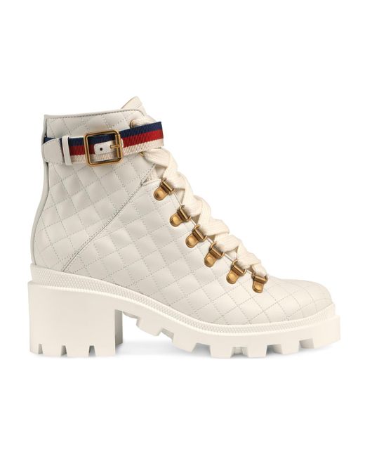 White gucci shop boots with fur