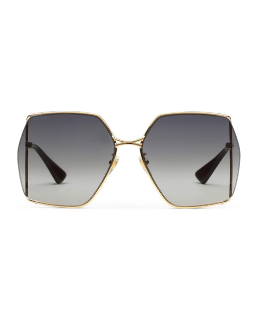 Gucci Metallic Sonnenbrille mit ovalem Rahmen