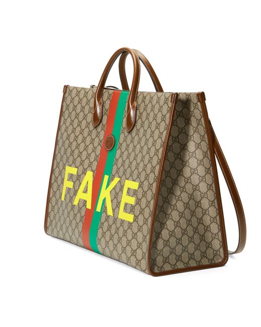 Download Gucci Canvas 'fake/not' Print Large Tote Bag in Beige ...