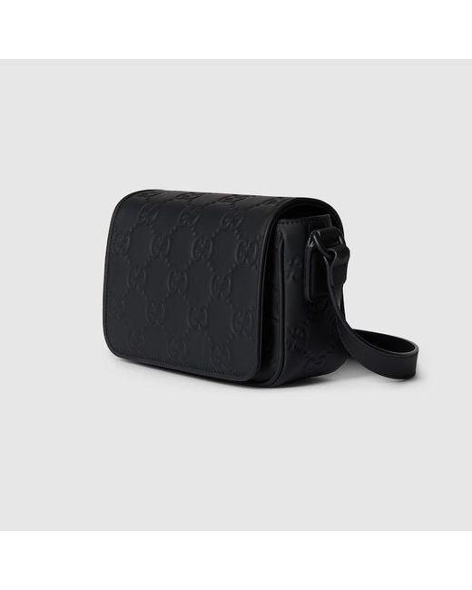 Gucci Black GG Rubber-effect Super Mini Bag for men