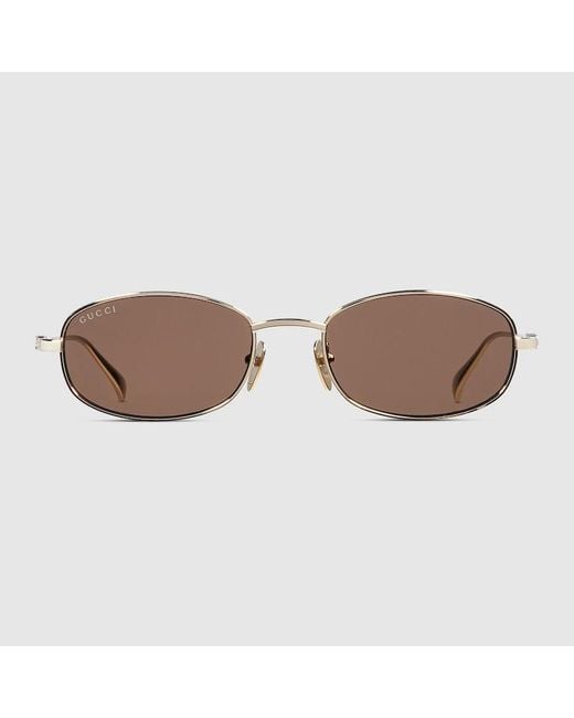 Lunettes De Soleil Ovales Gucci en coloris Brown