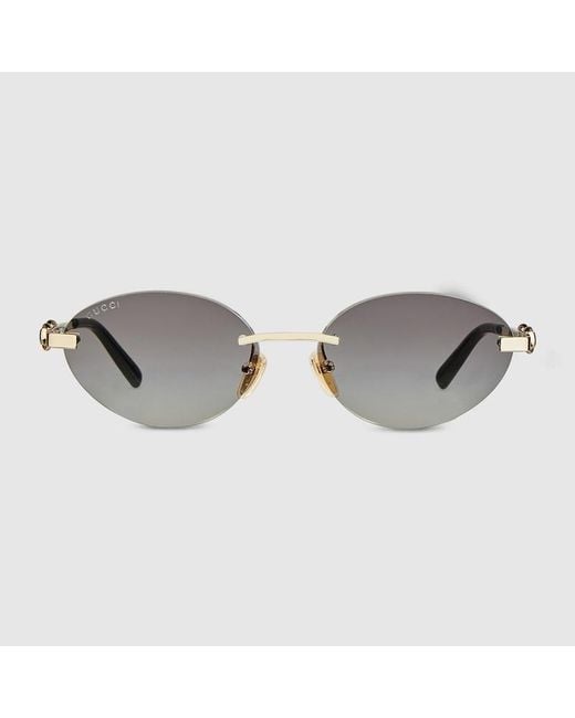 Gucci Metallic Frameless Oval Sunglasses