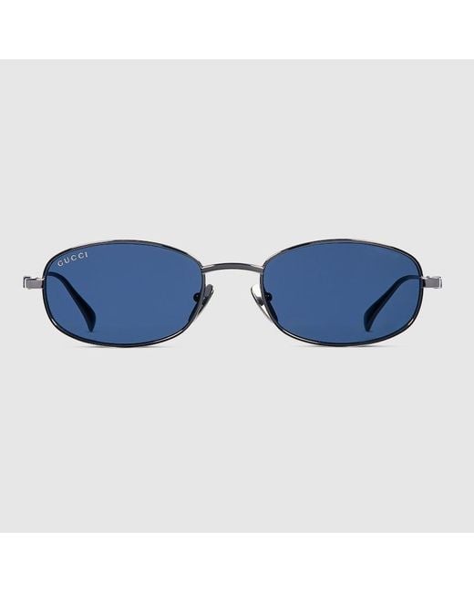 Lunettes De Soleil Ovales Gucci en coloris Blue