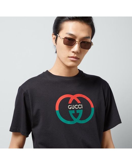 T-shirt in cotone con stampa del logo di Gucci in Black da Uomo
