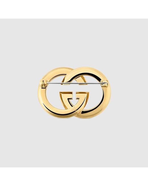 Broche Gg Enlacés Avec Cristaux Gucci en coloris Metallic