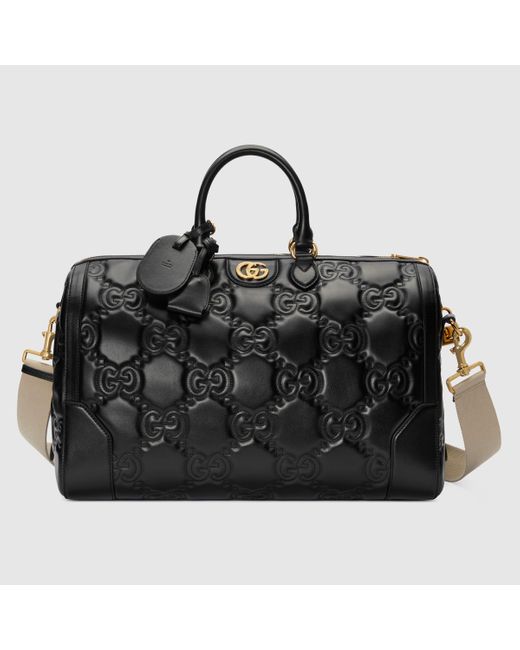 Gucci Mittelgroße GG Matelassé Reisetasche in Black für Herren