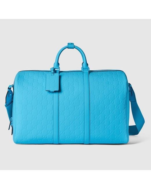 Gucci Blue GG Rubber-effect Large Duffle Bag for men
