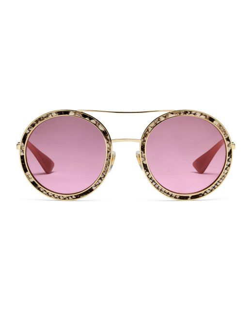 Gucci Metallic Sonnenbrille mit rundem Rahmen und Lederdetails