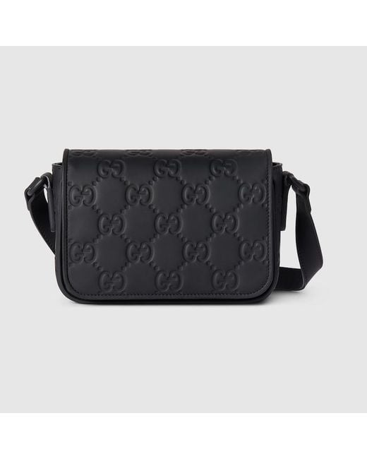 Gucci Black GG Rubber-effect Super Mini Bag for men