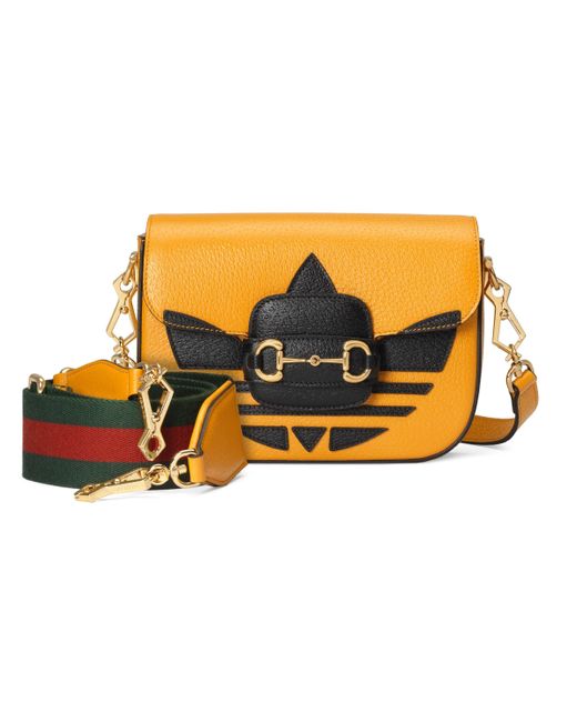 gucci bag with yellow strap